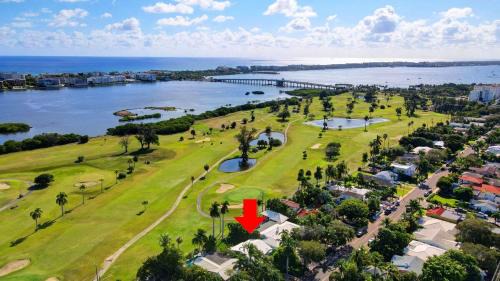 Parrot Cove House | Tropical Pool Home on Golf Course & Near Beach