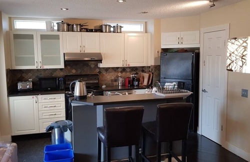 Tuscany House | Tuscan Ridge Guesthouse Calgary West