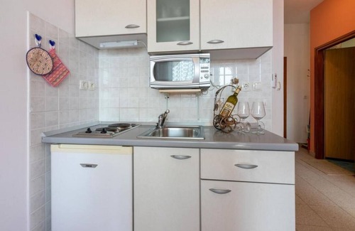 Lopar Apartment | Two bedroom apartment with terrace Lopar, Rab (A-18388-a)