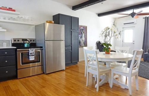 Talent Apartment | Two cottages with king bed bedrooms, dining area and full kitchen.