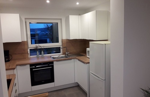 Karlburg Apartment | Vacation apartment 80 m² in the beautiful Main valley, large garden with seating