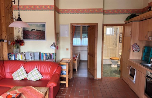 Henriettenhof Apartment | Vacation apartment with terrace & sauna and fireplace, ground floor, family-run & sunny