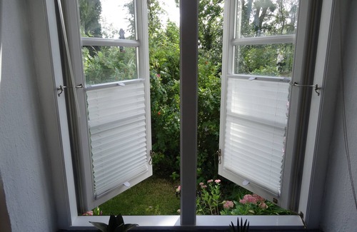 Pommerby Apartment | Vacation by the sea in a thatched house: WLAN free, garden, sauna from 2022, fireplace