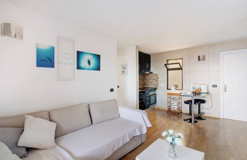 Puerto Rico Apartment | Vacation Home "Sunset" with Sea View, Shared Pool & Wi-Fi