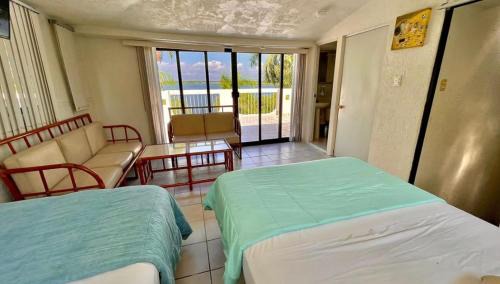 Tampico Villa | Villa #6 de 5 habitaciones, con vista directa a la Laguna de Chairel