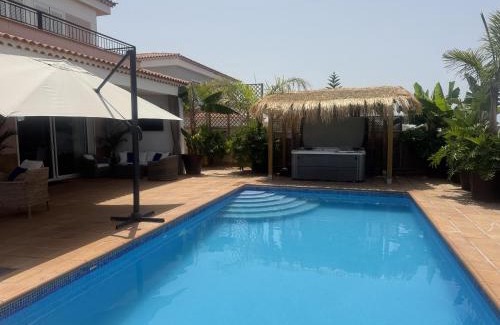 Puerto de Santiago Villa | VILLA BLOSSOM in the beautiful area of Puerto Santiago Tenerife with 5 bedrooms for up to 10 guests private swimming pool and many other activities to entertain the family Secure parking for 2 cars and disabled access throughout