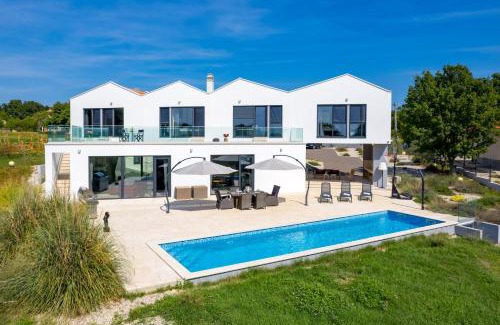 Baskoti Villa | Villa Corolan by Briskva