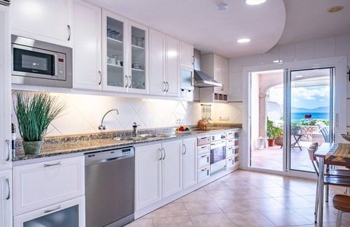 Alcanada Ski Chalet | Villa FARO for 8 in front of the sea in Alcanada with swimming pool