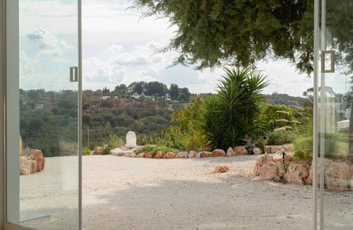 Fumarola Villa | Villa on an elevated terraced olive grove with views over the Valley of Itria.