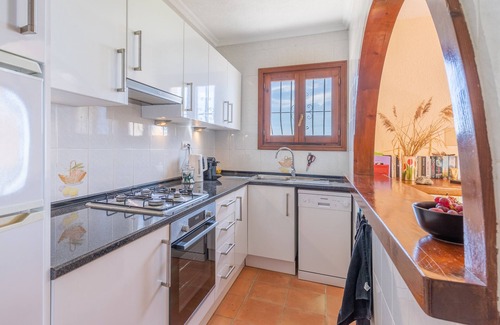 Benitachell Villa | Villa 'Vista Ibiza' with Sea Views, Private Pool, Garden, Balcony, Wi-Fi & A/C