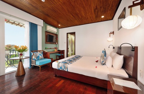 Minh An Hotel | Vinh Hung Riverside Resort & Spa