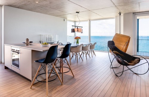 Kappeln Apartment | Vision: Luxurious apartment with wood-burning stove, Finnish sauna and Baltic Sea view