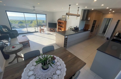 Napier House | Walk on Waterfront & big views define this newly renovated Beach House. Pets OK