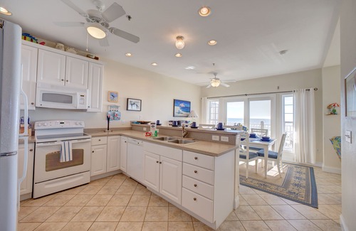 Hatteras Condo | Warm and friendly home in beachfront property- pool, hot tub & central AC