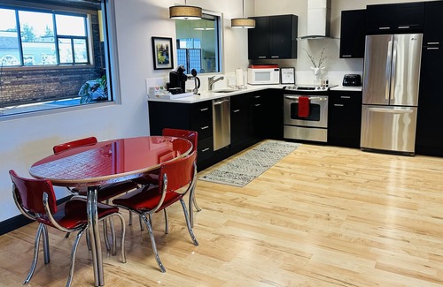 Petoskey Condo | Water View Loft in downtown Petoskey with reserved parking for two cars