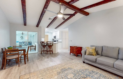 Lochmoor Waterway Estates House | Waterfront home with pool, bikes, grill, fireplace, internet, W/D, & central AC