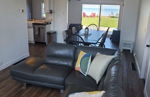 Pointe aux Roches House | Waterfront House next to Golf Course.