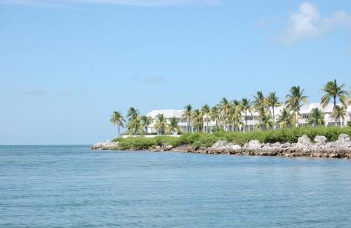 Coral Lagoon House | Waterfront luxury Villa 34 with sunset views and boat slip townhouse