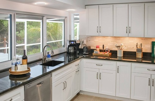 Fort Myers House | Waterfront Oasis: Heated Pool, Kayaks, Fishing, BBQ & Game Room