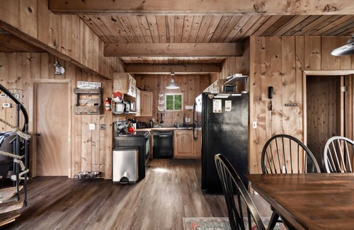 Great Cacapon Cabin | Waterfront w/Hot Tub, Fire Pit, Deck & Water Toys!