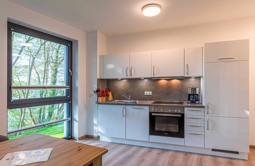 Krakow am See Apartment | Welcome to the 5-star Mantra Oasis vacation apartment directly on Lake Krakow.