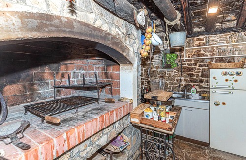 Drnis House | Welcome to this charming and traditional holiday home with pool in a delightful landscape.