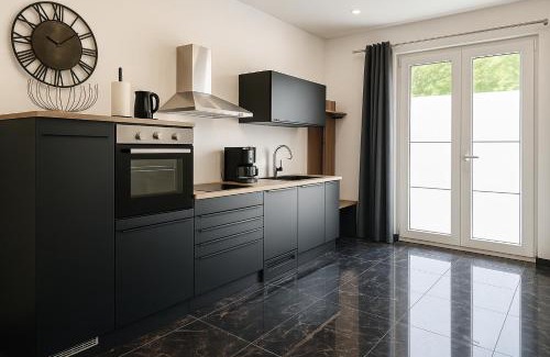 Loehne Apartment | Werre Apartments mit Smart-TV - stilvol, zentral & wohnlich