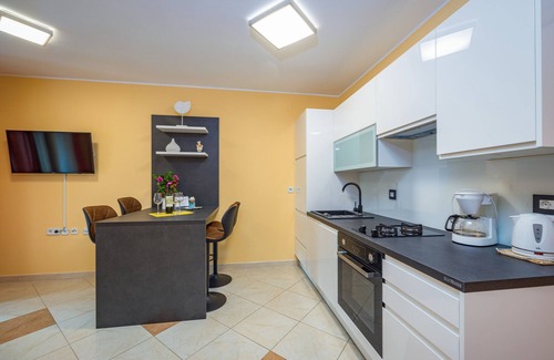 Fazana Apartment | Wonderful apartment for 4 people with pool and garden