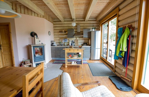 Templin House | Woodblockhouse on lakeland in between nature to relax with fireplace