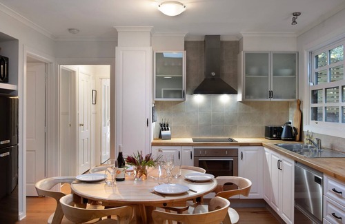 Daylesford House | Wrenwood Cottage 2 bedroom miners cottage with wood fire, 6 seater outdoor spa and 2 person indoor s