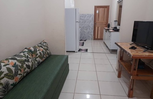 Prado House | Yellow vacation home