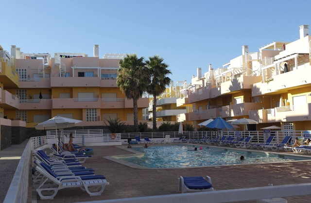 2 Bedrooms apartment on a private complex with swimmingpool and near the beach