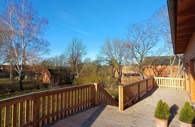 2 vacation apartments with shared large balcony for 8 to 10 people can be booked