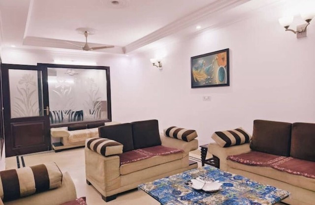 2BHK- GK 2 near M Block Market! by HostMyStay