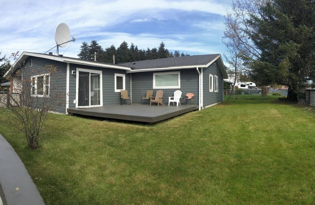 3 bed 2 bath house w/covered parking spot and fenced backyard.