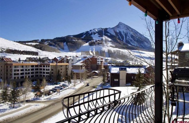 4 BDRM, Mountain side, meticulously remodeled with heated outdoor pool, hot tub, and sauna. Short walk to chairlifts. Bus stop on-site