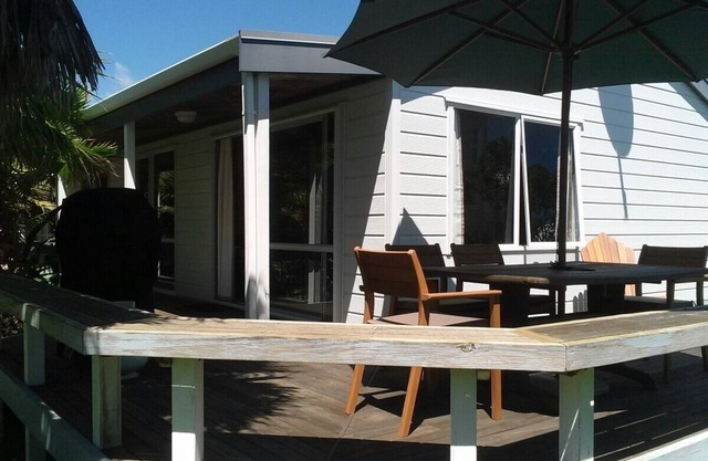 5 minutes walk to beautiful beach & shops, fully fenced section pet friendly.