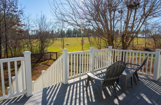 55-acre Countryside Farmhouse with Fireplace and Carport