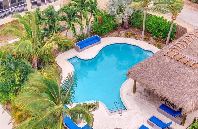 6BR/6BA Pelican's Nest: Oceanfront Home With Pool, Tiki Bar, and 150' Boat Dockage