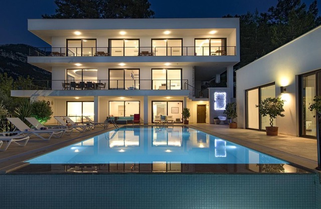 A 6-bedroom private, waterfront villa with an outdoor pool. Rents per week.