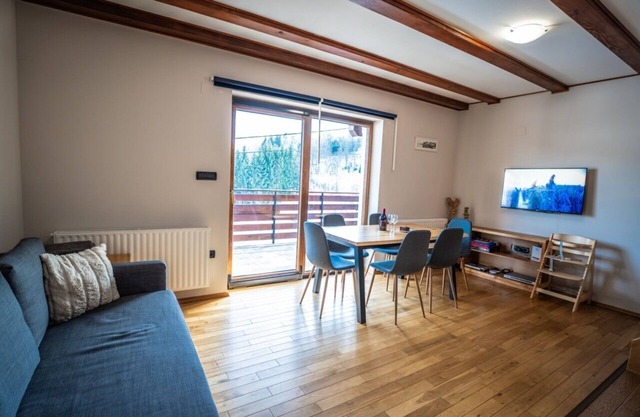 A cozy chalet with large backyard and a spaces for socializing