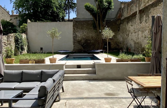 A "French Country House in Town" with private garden, pool and cinema room