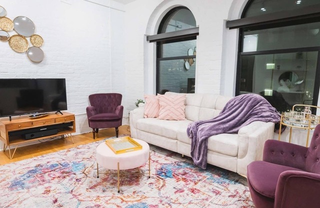 A historic beautifully detailed suite, 1,300 square foot, corner loft in the heart of the Old Market