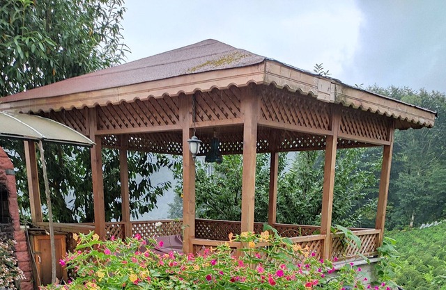 A House with Garden and Summerhouse in Nature