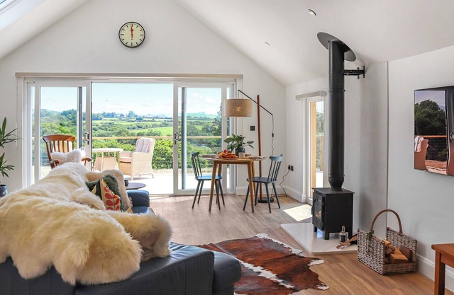 A luxury cottage with private Hot Tub and stunning countryside views.