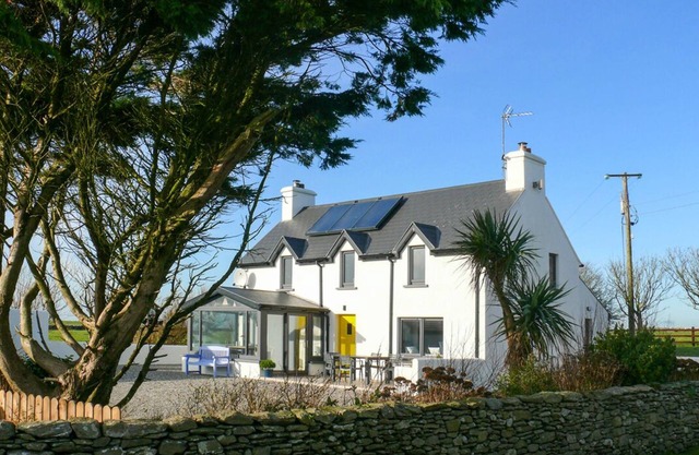 A perfectly reclaimed cottage with uninterrupted views of the Atlantic Ocean.