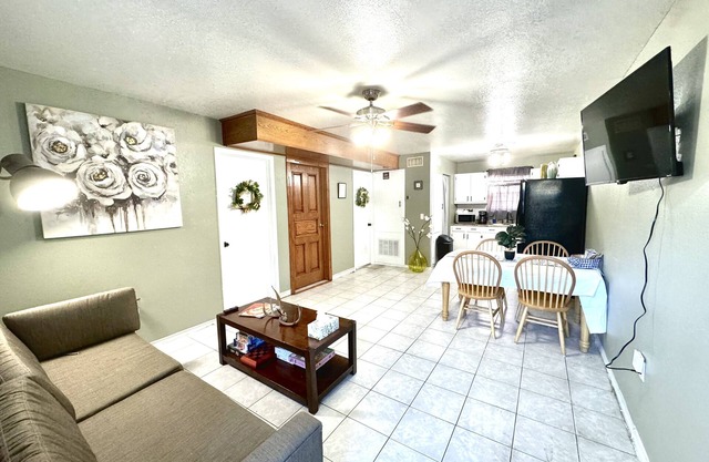 A quiet and cozy condo with TVs in every space