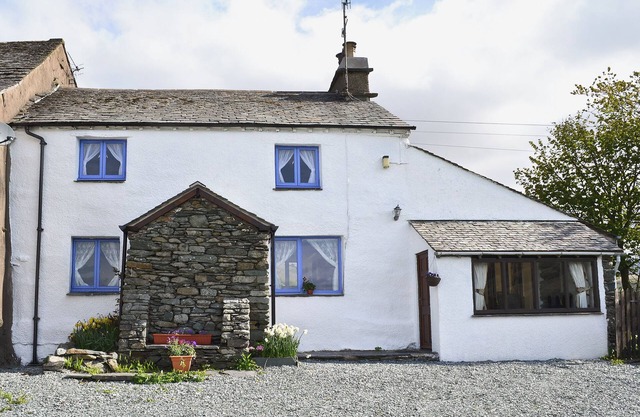 A traditional farmhouse in an idyllic setting high above Ambleside.