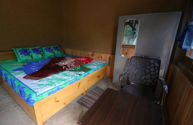 ABOUT TIRTHAN HILL TOP HOMESTAY