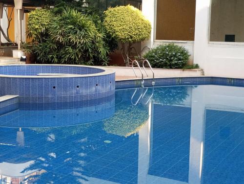 Amazistay offers Posh room for two with private balcony & bathroom & TV, Traveller, with shared Jacuzzi paid access near Brigade Senate